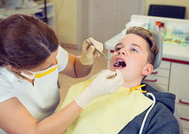 Teenage boy at the dentist