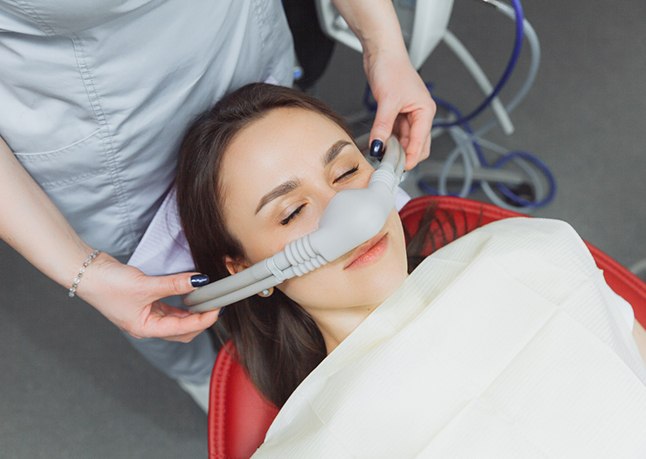 female dental patient receiving nitrous oxide sedation 