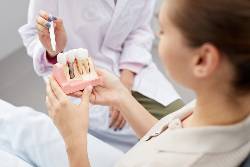 A patient asking about a dental implant